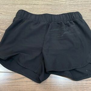 Black athletic shorts.